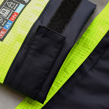 ProGARM 9150 Hi-Vis Yellow/Navy Unlined Waterproof Arc Flash Jacket 9.3 cal/cm² APC 1